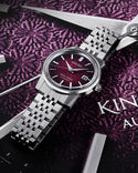 King Seiko Men KING SEIKO Maroon Analog Automatic watch SKU ID SJE103J1 Helios The Watch Store